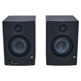 Black studio monitor pair, close-up front with tweeter and woofer cones