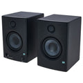 Pair of black studio monitors with tweeters and woofers, front view