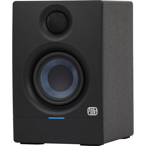 Front view of black studio monitor speaker with blue woofer ring and oval tweeter grille