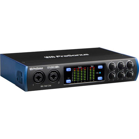 Black USB-C audio interface with display meters and control knobs