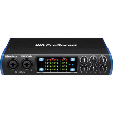 Front view: black USB audio interface with two mic/line inputs and gain knobs