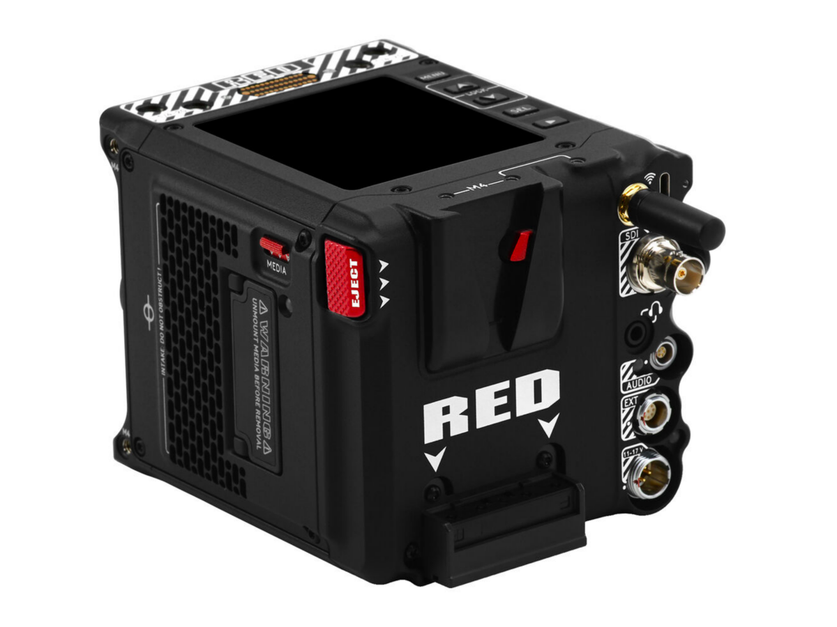 Komodo-X camera angled view with side controls and cable connectors on black body