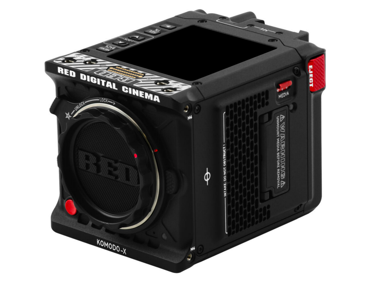 Komodo-X camera front-right view with lens, top buttons, and red media marker