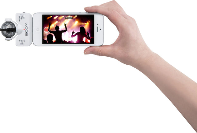 iQ5 portable microphone with phone holder, shown being held in hand