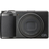 Black compact camera front with lens cap-like cover and GR logo on right side