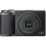 Black compact camera front view with large lens glass and GR logo on right