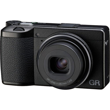 Black compact camera with attached lens, front view