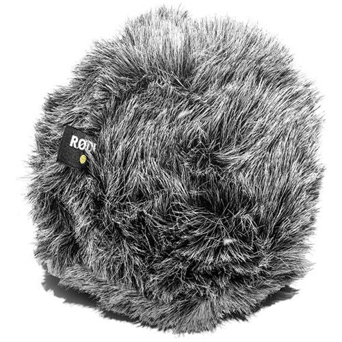 Gray furry foam windscreen with small brand logo on microphone