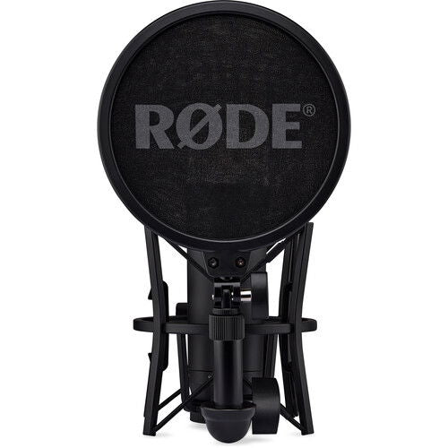 Black studio condenser microphone with circular pop filter and stand mount