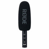 Shotgun microphone with foam windscreen and front label, bottom controls and port