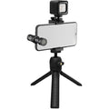 Vlogger kit with compact LED light, microphone, and phone holder on tripod stand