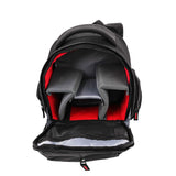 Front view of open black camera backpack showing red interior padding and zip compartments.