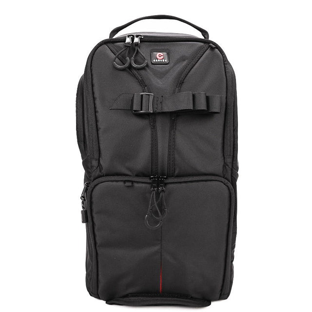 Black camera backpack with front harness straps and zip pocket, compact Skydex 10