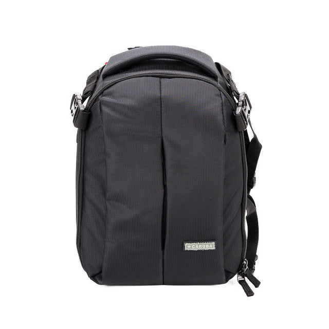 Black camera backpack with front zip pocket and padded top handle, side straps