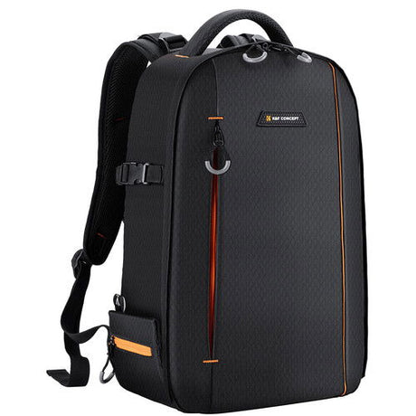 Black multifunction camera backpack with top handle, side strap, and orange trim accents