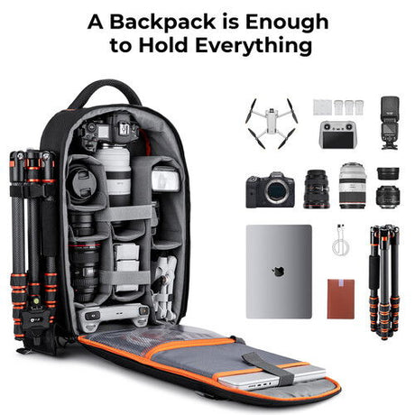 Opened camera backpack interior with gear organizer panels and orange-lined padded base
