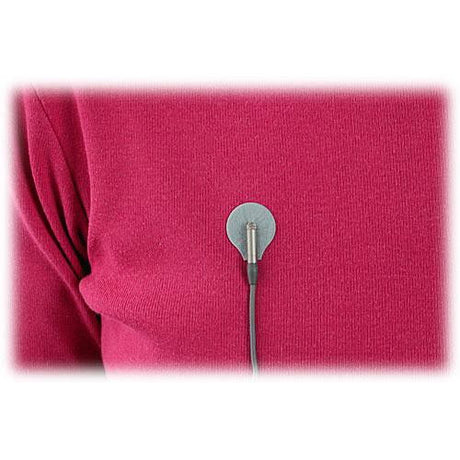 Lavalier mic with small grey foam cover attached to fabric