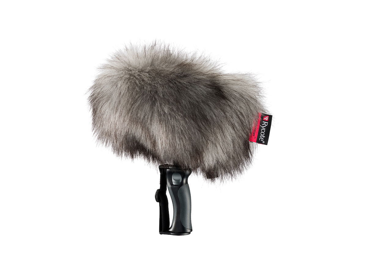 Microphone kit with gray furry windscreen on handle-style shock mount