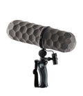 Gray honeycomb mic windscreen on black shock mount