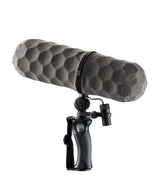 Gray honeycomb mic windscreen on black shock mount