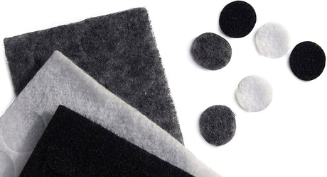 Assorted lavalier microphone covers, black, dark grey, and white circles