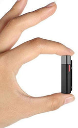 Black Bluetooth microphone held in hand, showing red LED and side control switch