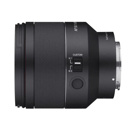 Side view of black 50mm f/1.4 lens with custom M1/M2 switch and textured ring