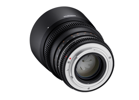 Front view of black 85mm T1.5 MFT lens showing glass element inside metal hood