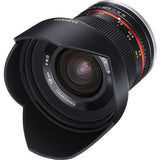 Black wide-angle mirrorless lens with hood, front glass and focus ring markings
