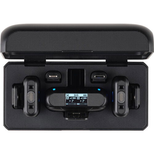 Front view of open charging case with two transmitters and receiver screen