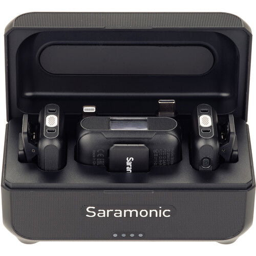 Top view of open case: two transmitters and receiver cradle, blue status lights