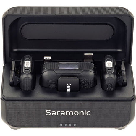 Top view of open case: two transmitters and receiver cradle, blue status lights