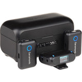 Wireless receiver case with two handheld transmitters, blue indicator lights