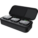 Open black carrying case with three wireless mic units and foam windscreen pieces