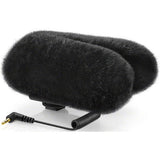 Stereo shotgun microphone with black fluffy windscreen and attached audio cable