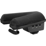 Black stereo shotgun microphone with side housing, top controls, and coiled cable