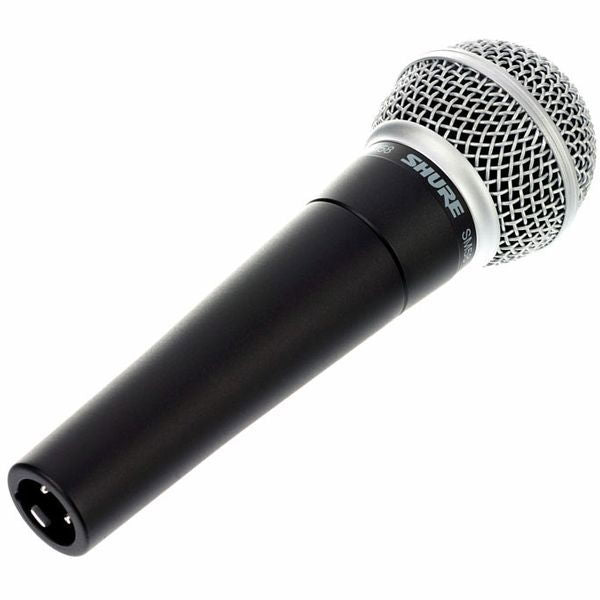 Side view of black dynamic microphone with silver mesh head and round output port