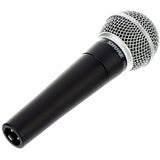 Side view of black dynamic microphone with silver mesh head and round output port