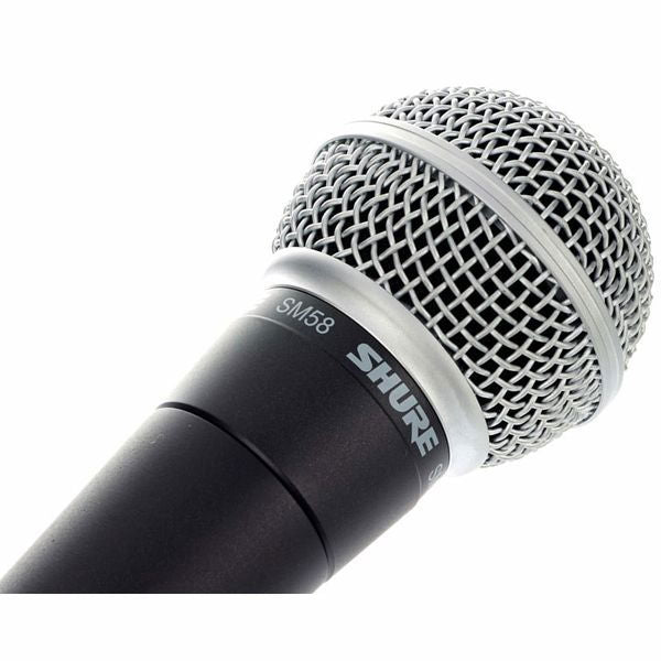 Close-up of metal mesh microphone head with silver ring and black body band