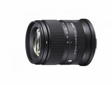 Black 18-50mm f/2.8 DC DN zoom lens with front glass and ridged barrel