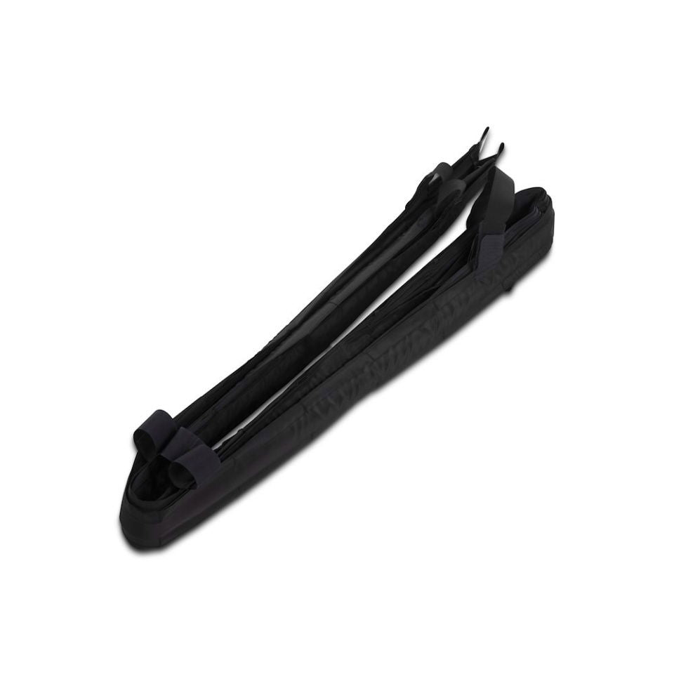 Folded black carry bag with grab handle straps for SNAPGRID panel