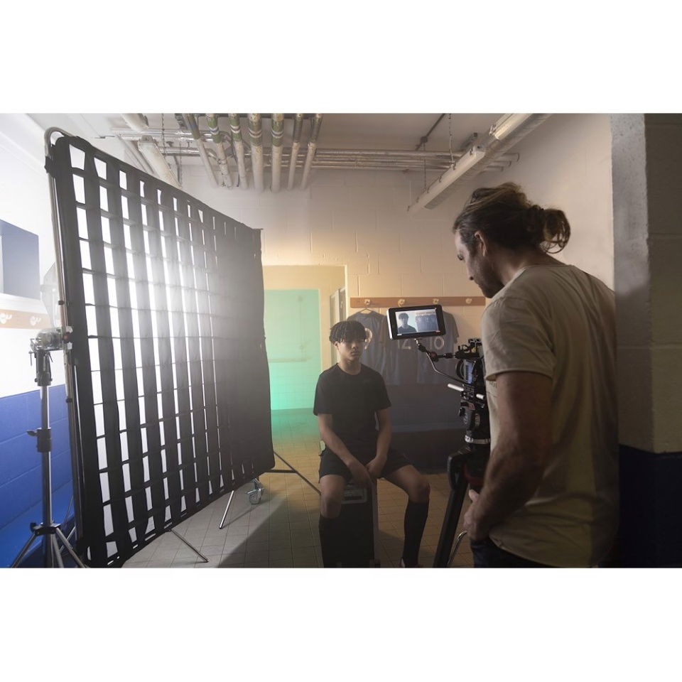 SNAPGRID grid panel mounted on tripod stands