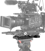 QR tripod plate attached to a video camera rig for tripod mounting