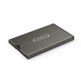 Compact gray memory card case with hinged lid, closed, logo on top