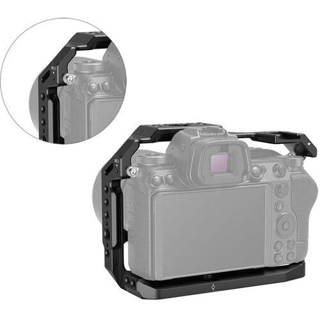 Dark gray camera cage with rear access and side screw holes, shown on camera body