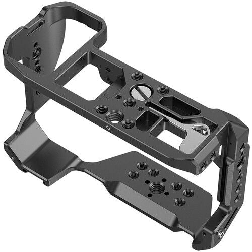 Dark gray camera cage base with multiple threaded holes and accessory mounting slots