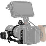 Mounted follow focus with adjustment knob and gear focus ring, shown in profile