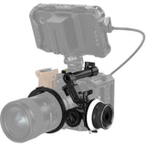 Follow focus unit mounted to camera cage, with knurled knob and gear ring