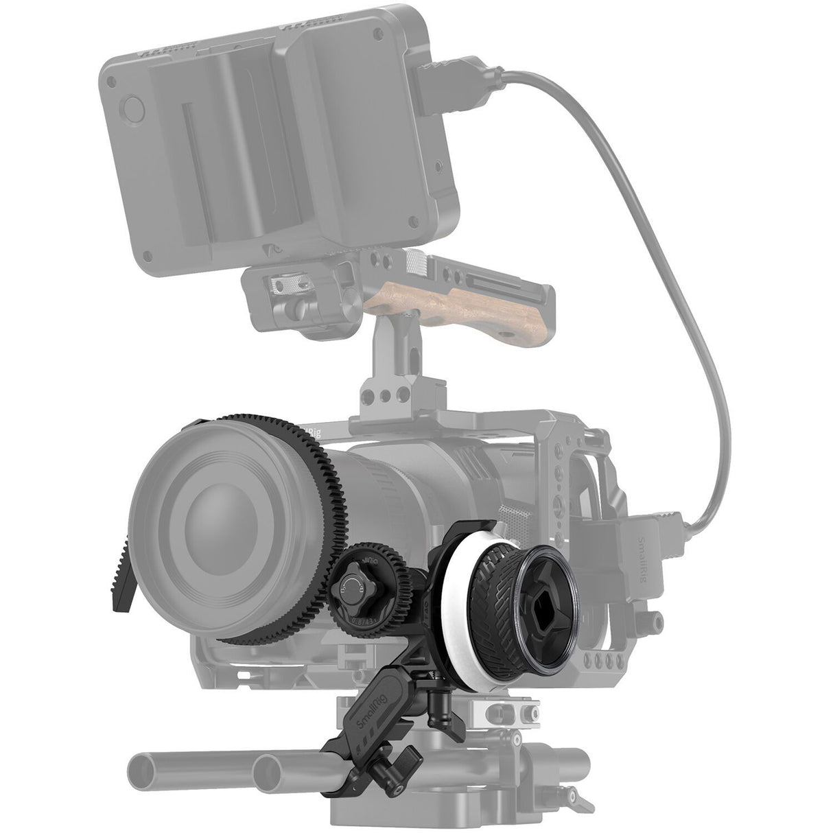 Follow focus system on rig, focus ring at left with cable and side mount