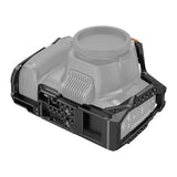 Side view of black camera cage with multiple port cutouts and mounting rails